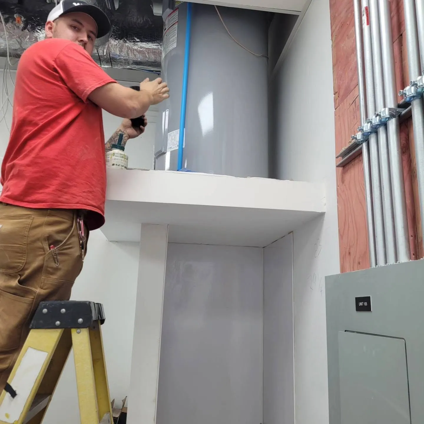 Sabon Plumbing technician working on a Calgary job site