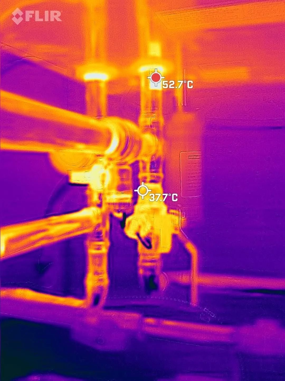 Thermal camera image showing in-floor heating loops running evenly across a Calgary floor